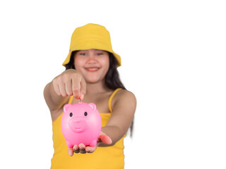 Woman Putting Coin In Piggy Bank, Indoors.