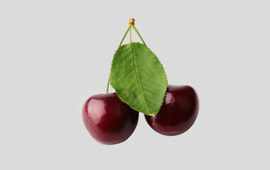 Two sweet cherries isolated on a white background. Close-up. Top view.