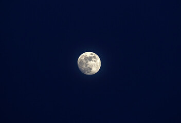 Naklejka na ściany i meble Full moon in dark blue sky
