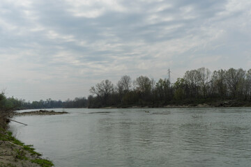 Obraz premium View of the Tanaro river near Alba, Piedmont - Italy