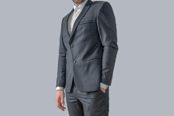 Man in elegant custom tailored expensive suit posing