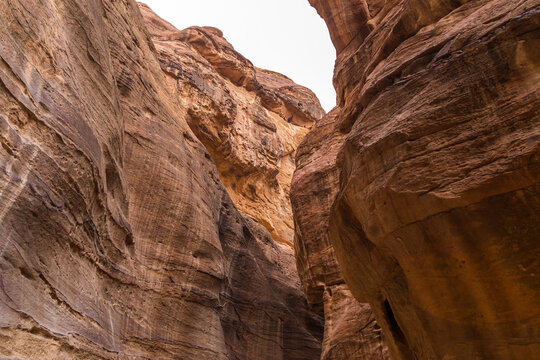 
Red rocks in Jordan on the road to the stanitsa town of Petra on a sunny summer day.