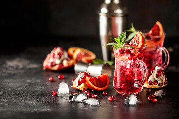 Red cocktail with blood orange and pomegranate.