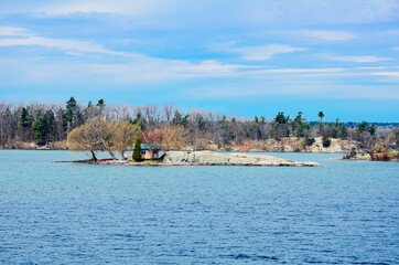 Fototapeta na wymiar A small island in Saint Lawrence River