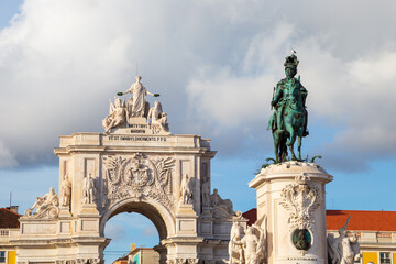 Fototapeta na wymiar Lisbon Portugal: Equestrian statue of King Dom Jose I and Arco da Rua Augusta (Arch) are the prominent landmarks on Praca do Comercio - Commerce Square in the historical city center. Copy space.