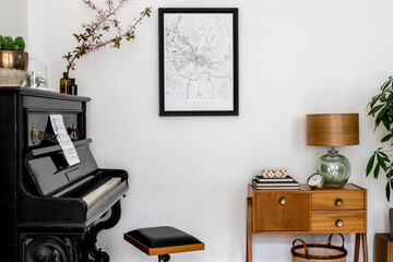 Modern composition of home interior with stylish black piano, design cabinet, cacti, flower, lamp,...