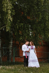 A couple in love in Russian traditional dresses