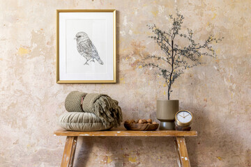 Stylish composition of living room interior with gold mock up frame, wooden bench, pillow, plant,...