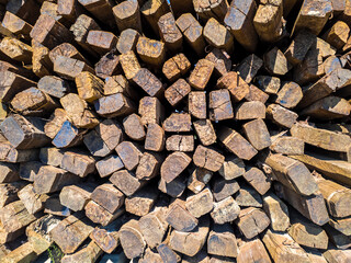 Pile of wooden railroad ties (sleepers), used and discarded.