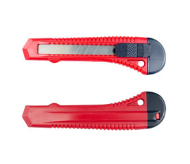 red cutter made of metal, which is used to cut paper or boxes. isolated on white background with clipping path
