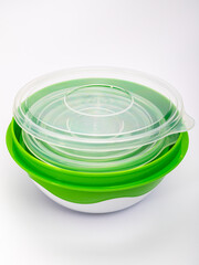 set of plastic food storage containers with a pattern on the lid