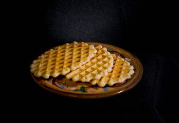 waffles on a black background
