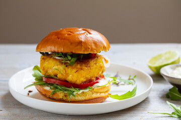 Turmeric fish burger in brioche bun