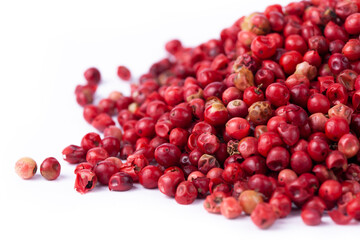 pink peppercorns in white natural spice