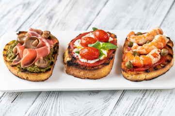 Italian buschettas with different toppings