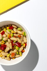 homemade bean salad with carrots, avocado, pepper