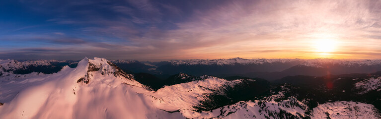 Fototapeta na wymiar Aerial Panoramic View of Canadian Mountain Landscape during a colorful sunset. Taken in Garibaldi, near Whistler and Squamish, North of Vancouver, British Columbia, Canada. Nature Background Panorama