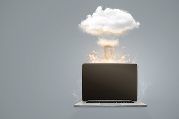 Computer failure - mushroom cloud above a laptop