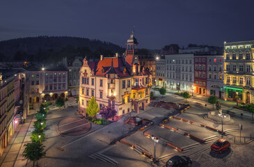 Nowa Ruda, Poland. Aerial view of Town Hall and Market Square (Rynek) at dusk