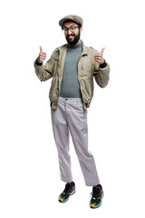 Smiling young man with a beard and glasses holds thumbs up. Full height. Isolated on a white background. Vertical.