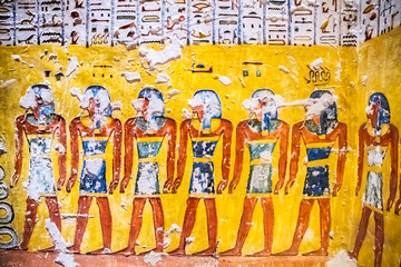 Burial chamber with colorful Egyptian hieroglyphics at the valley of the kings, Luxor, Egypt