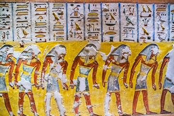 Burial chamber with colorful Egyptian hieroglyphics at the valley of the kings, Luxor, Egypt