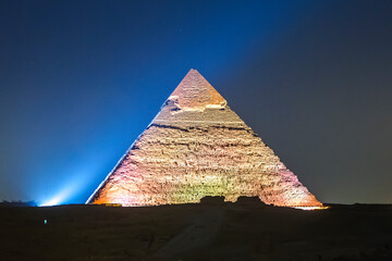 Fototapeta na wymiar Great Pyramid of Giza illuminated at night, UNESCO World Heritage site, Cairo, Egypt.