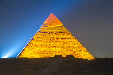 Great Pyramid of Giza illuminated at night, UNESCO World Heritage site, Cairo, Egypt.