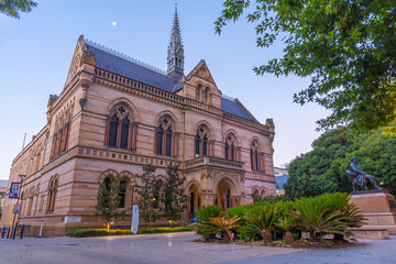 Sunset view of statue of Sir Walter Hughes in front of the University of Adelaide in Australia