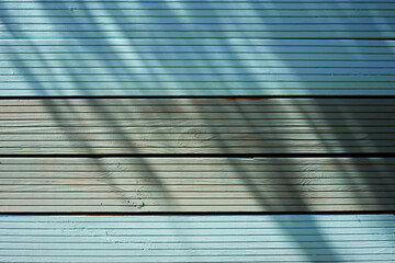 Wood wall in the shadows