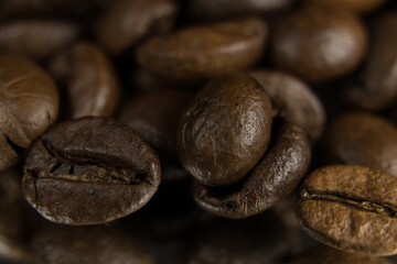 Fragrant fried coffee beans. close-up texture