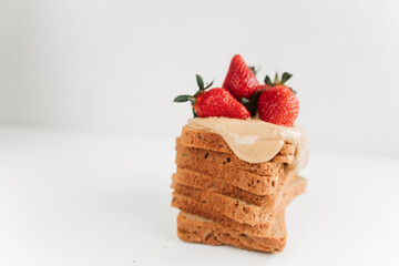 toast bread with peanut paste and strawberries