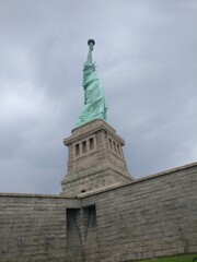 Fototapeta na wymiar statue of liberty island new york skyline