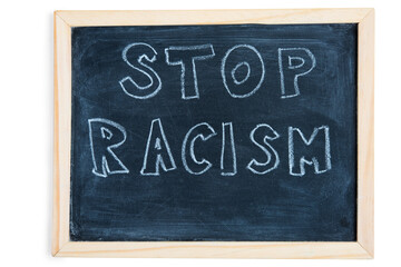 Obraz premium Stop racism - written on chalkboard. Concept message