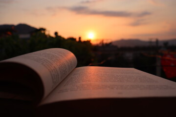 open book with sunset