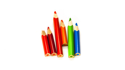 Bunch mini colored pencils isolated on white. Multicolor group of cute small pencils