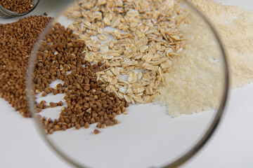 Mixed cereals, buckwheat, oatmeal, rice on the background