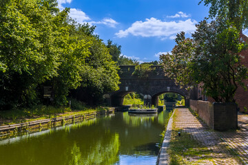 A view of a canal bridge over the Dudley canal in summertime