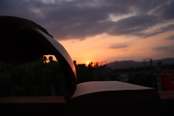 Fototapeta na wymiar open book with sunset