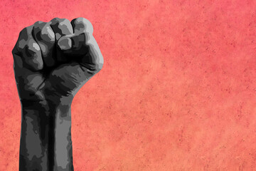 Black fist raised calling for freedom and equality with copy space.