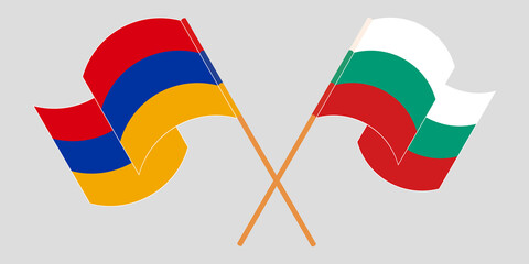 Crossed and waving flags of Armenia and Bulgaria
