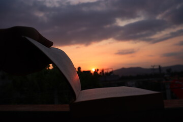 open book with sunset