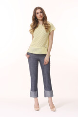 business woman executive posing in official sleeveless blouse , culottes trousers