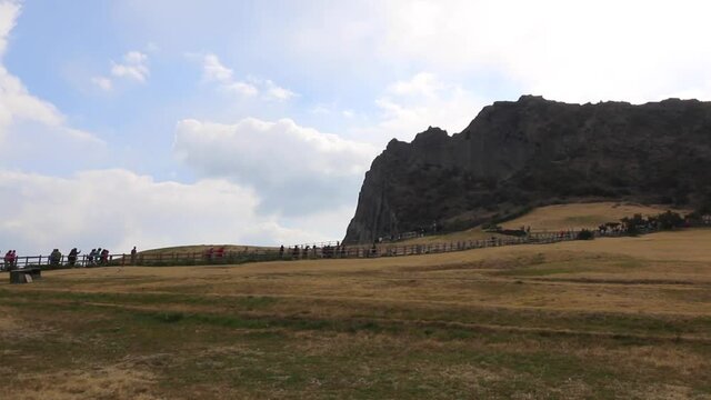 Scenery of Seongsan Ilchulbong (Sunrise Peak), archetypal tuff cone on Jeju Island in South Korea in March 2017.