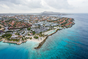 Aerial view of coast of Curacao in the Caribbean Sea with turquoise water, cliff, beach and...