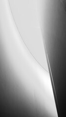 Abstract monochrome background in grey tones with long curved lines and gradients