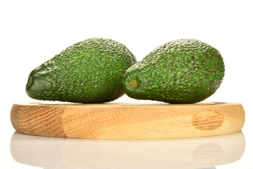 Green fresh ripe tasty avocado, close-up, on a white background.
