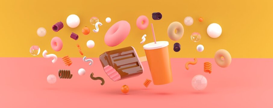 Ice cream and water among the donuts on an orange and pink backdrop.