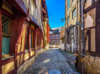 Fototapeta na wymiar Street with timber framing houses in Rouen, Normandy, France. Architecture and landmarks of Rouen. Cozy cityscape of Rouen