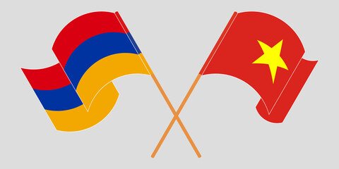 Crossed and waving flags of Armenia and Vietnam